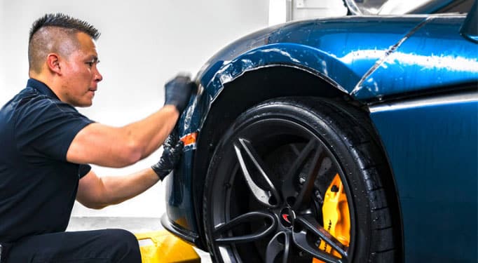 finishing putting ppf and clear bra on a car