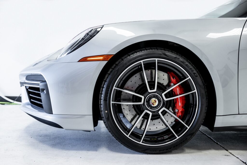 Close up of Porsche Turbo 911 front end and rim