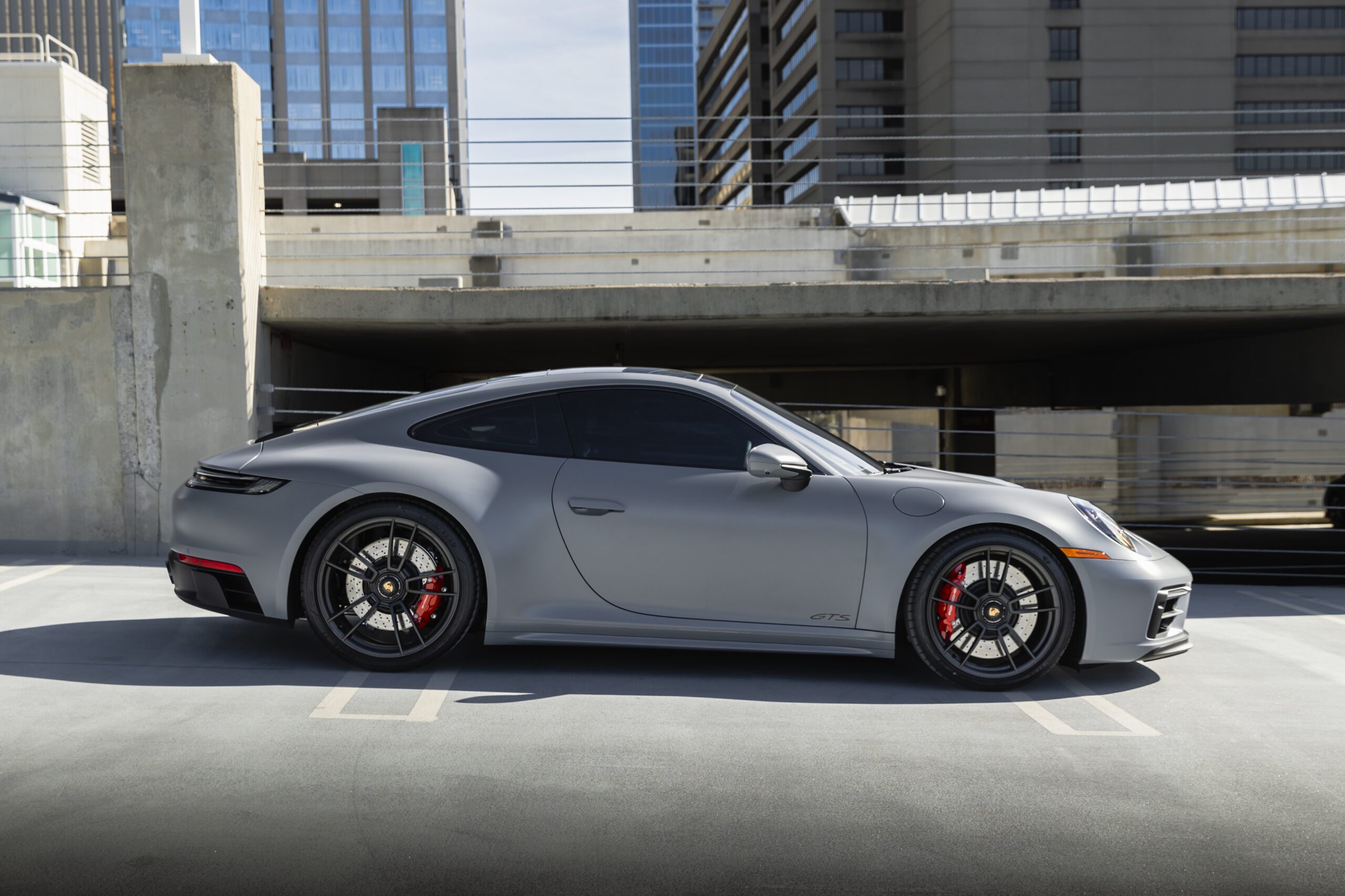 grey porsche with dark tinted windows