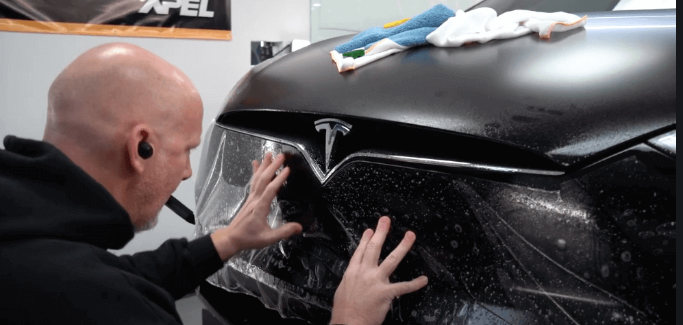 applying XPEL Tesla paint protection film