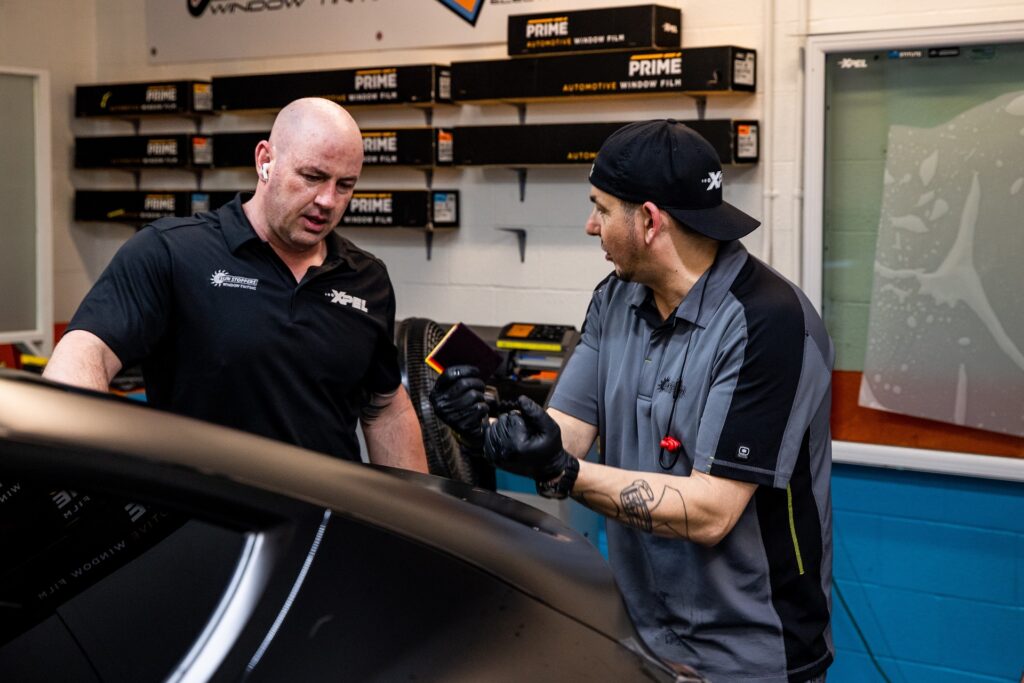 Sun Stoppers working on Tesla paint protection