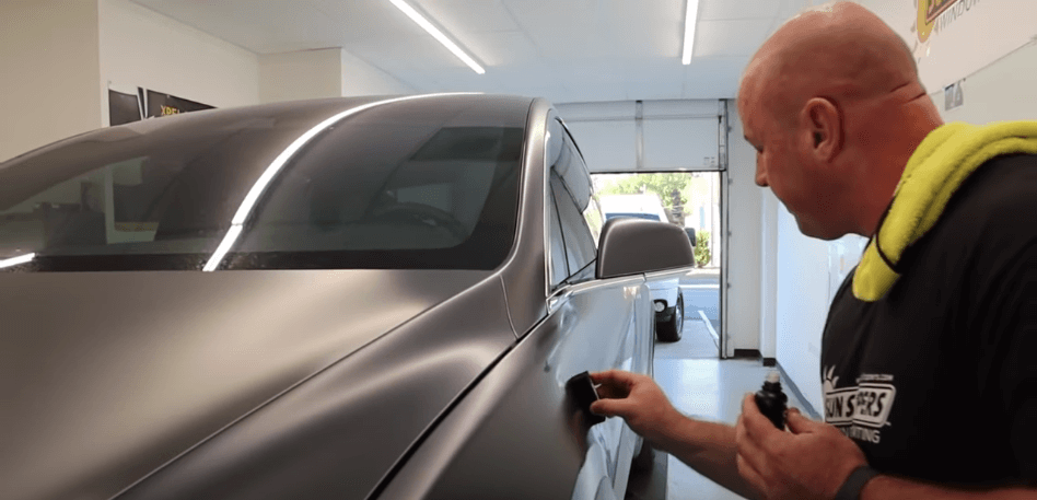 A stealth Tesla gets with a ceramic coating by Sun Stoppers owner, Mike Burke