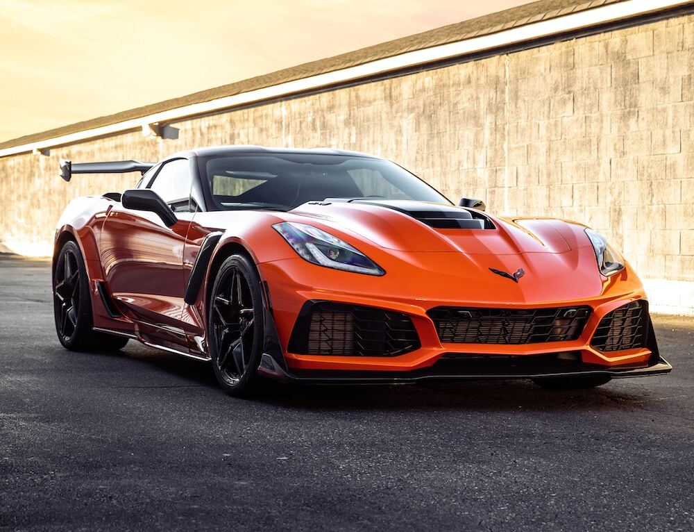 ceramic coating on an orange car