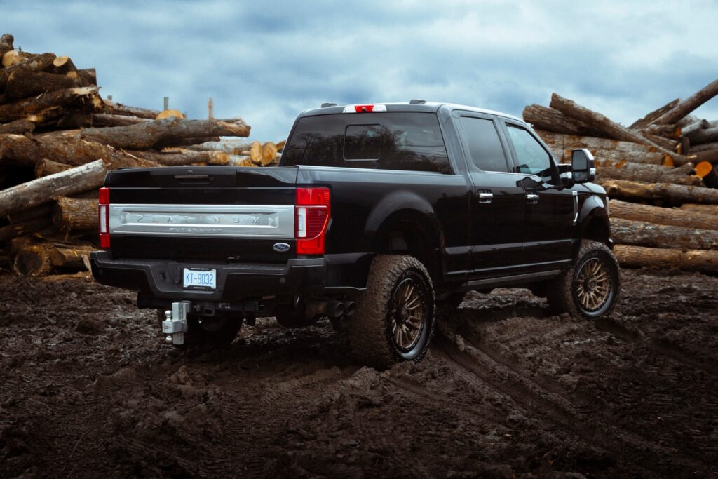 ford truck parked in the mud