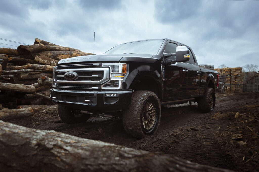ford truck parked in the mud