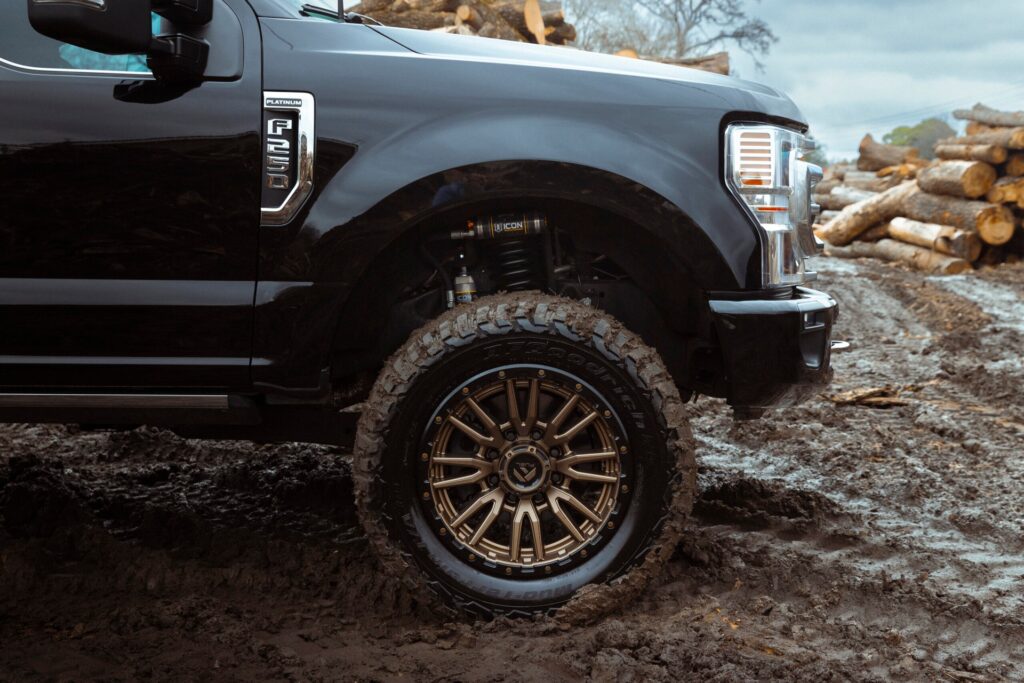 Icon vehicle dynamics suspension system on a muddy tire