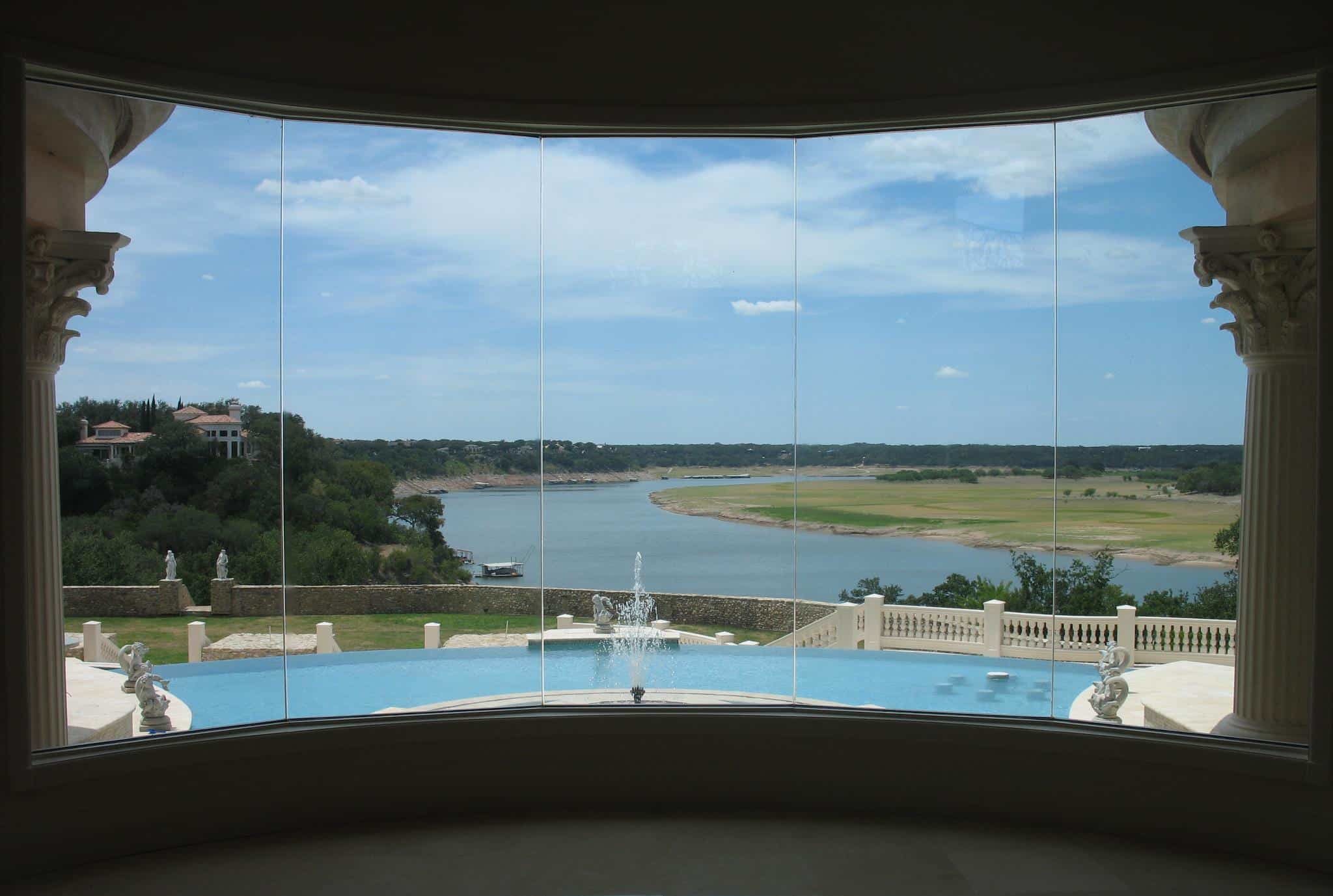 Tinted windows looking out to water.