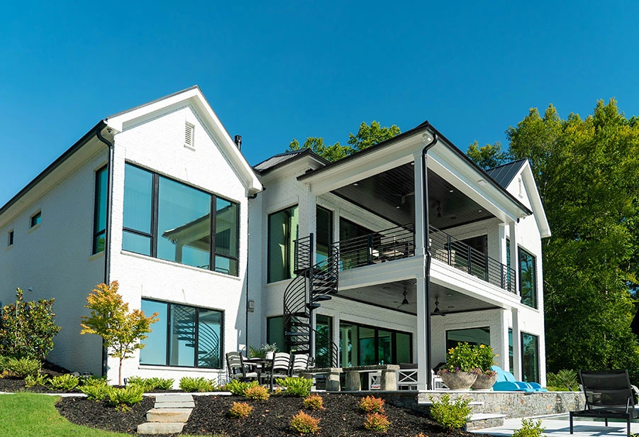 Home window tinting on a large house.