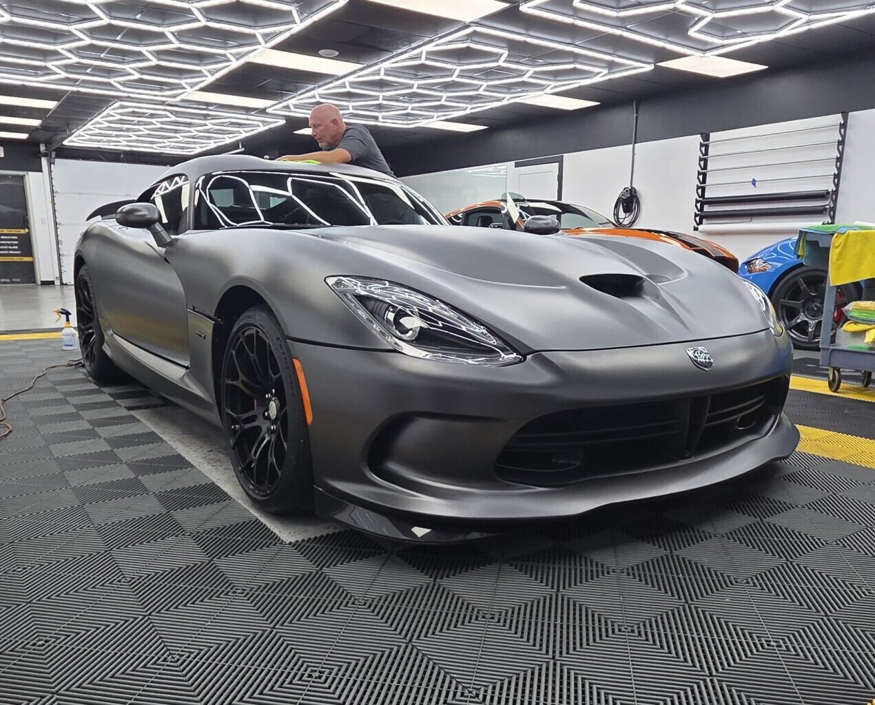 Gray Dodge Viper with window tint at Sun Stoppers shop