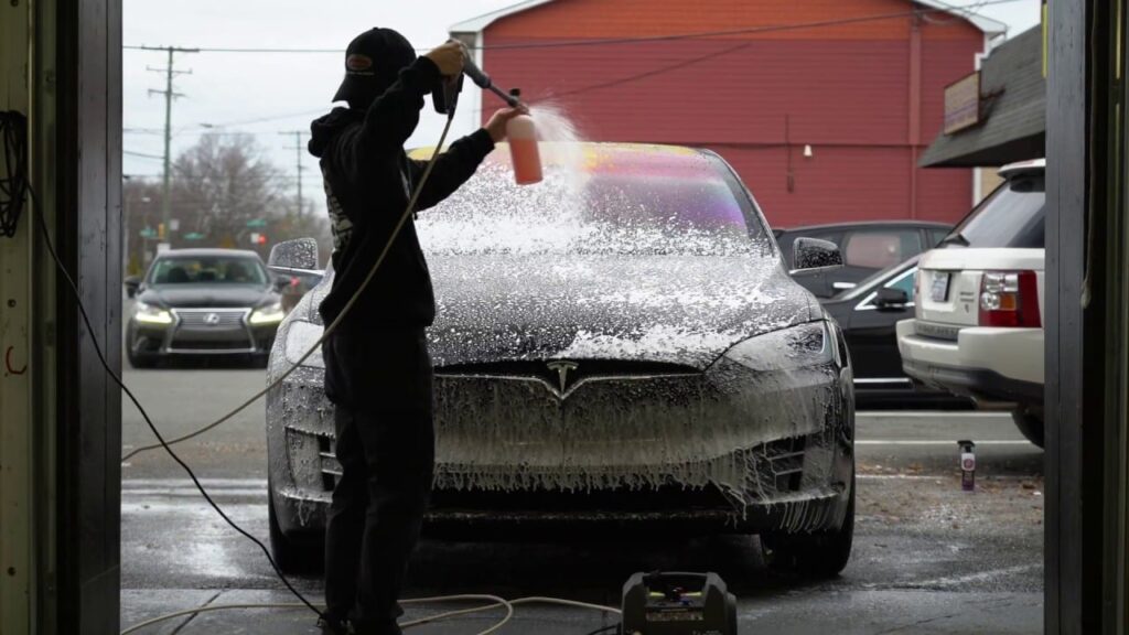 Washing a finished Tesla window tint application