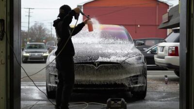 Cute and Bubbly Tesla Model X turns into a dark and menacing BEAST!