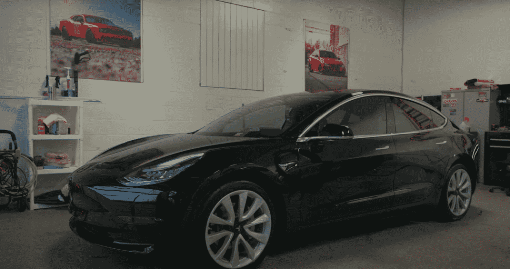 Black Tesla car with finished window tint film