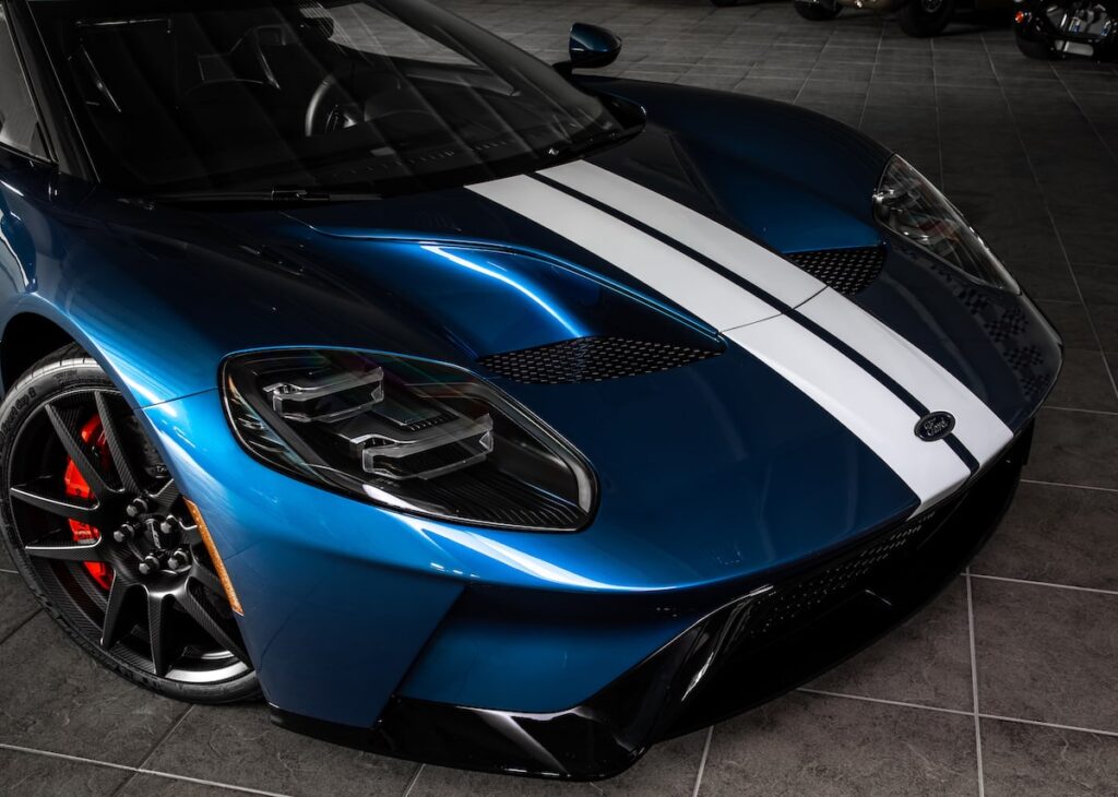 a blue sports car with paint protection film