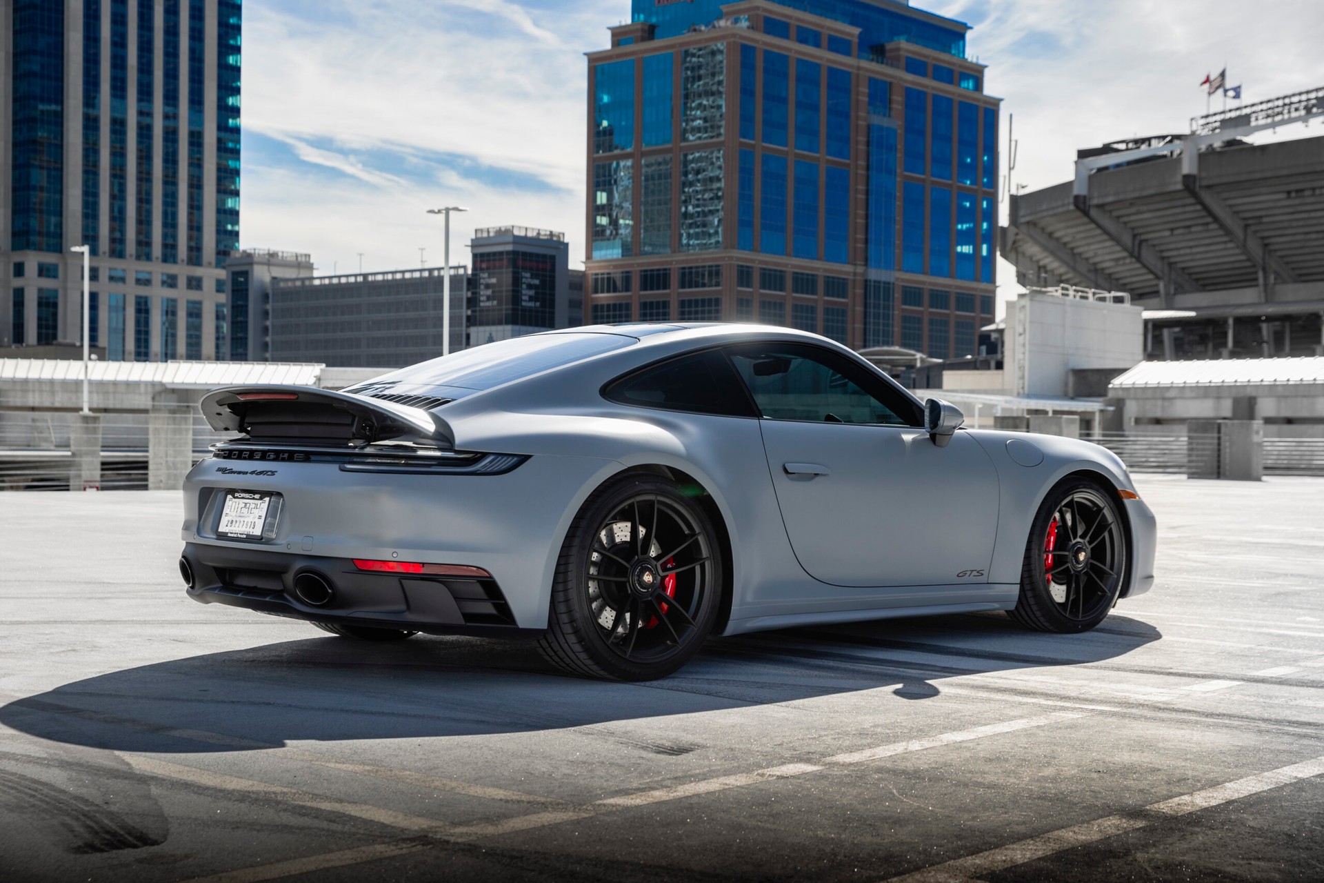 silver porsche with tinted windows